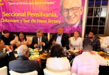 Comunitarios del PLD en un encuentro con la diáspora